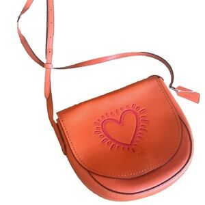 Coach x Keith Haring crossover orange heart purse